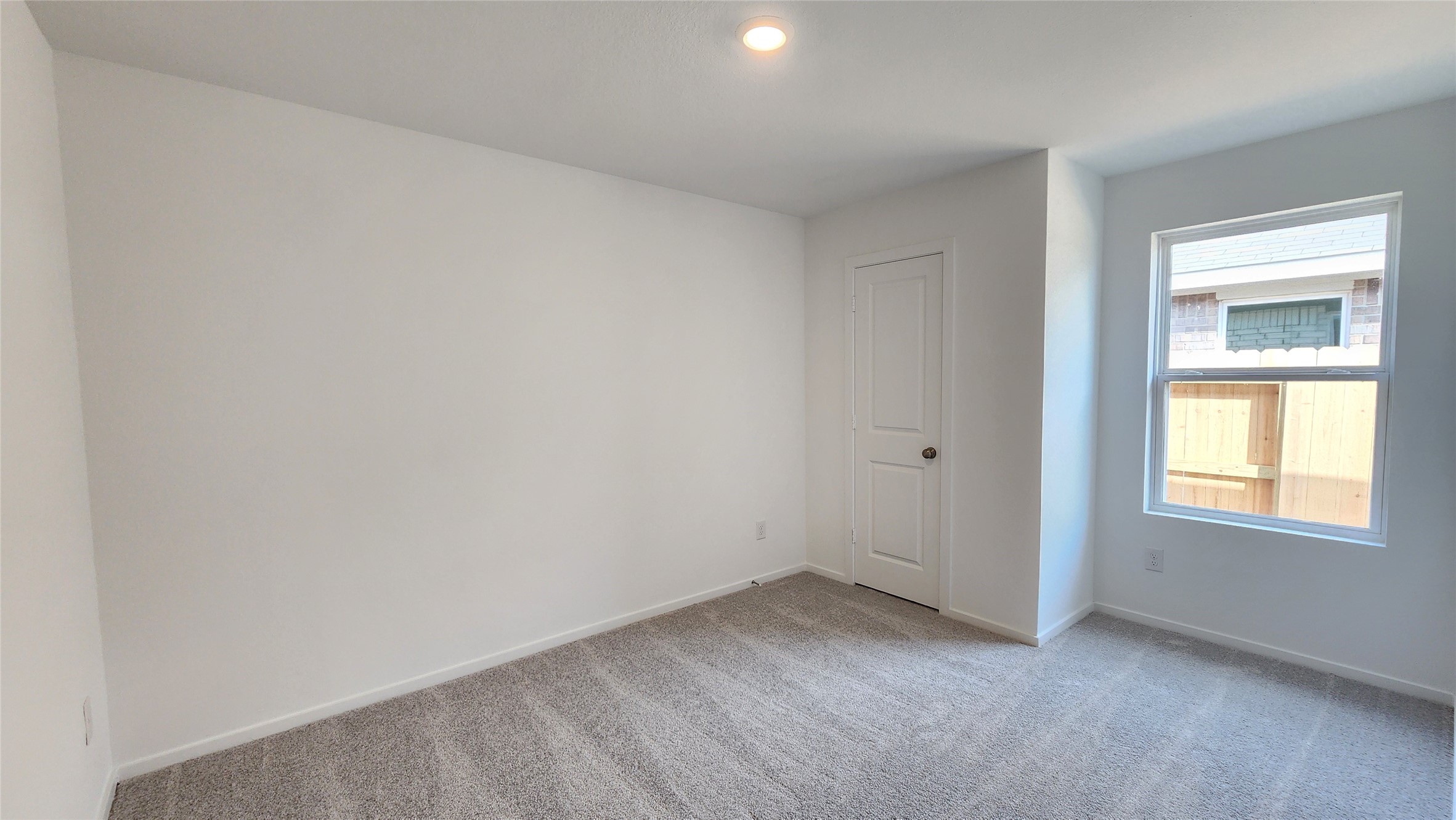 26850 Cascade Sunrise Street Katy, TX 77493 - Photo 33 of 40 an empty room with a window