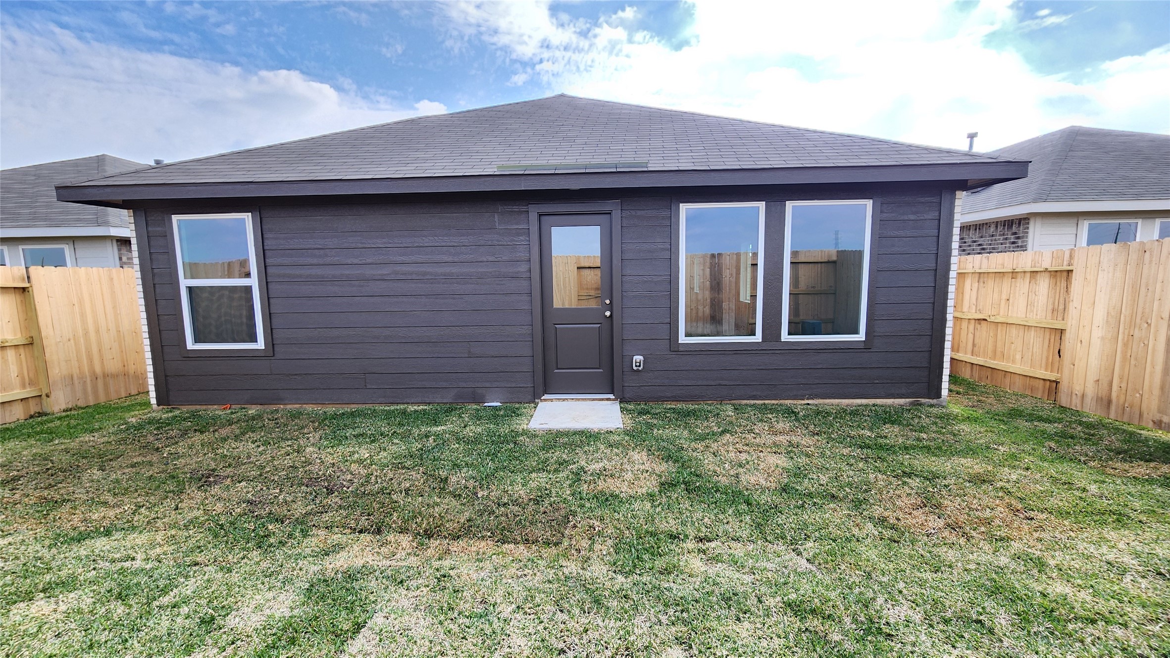26850 Cascade Sunrise Street Katy, TX 77493 - Photo 37 of 40 a view of front of a house with a yard