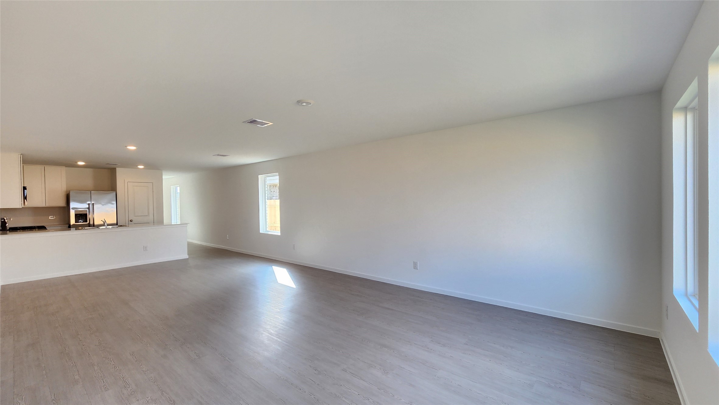 26850 Cascade Sunrise Street Katy, TX 77493 - Photo 7 of 40 a view of empty room with wooden floor