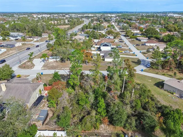 an aerial view of residential building and lake view
