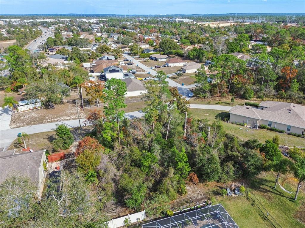 13014 Hanley Drive Spring Hill, FL 34609 - Photo 26 of 30 an aerial view of residential houses with outdoor space