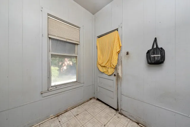 a view of a bathroom that has a sink and a window
