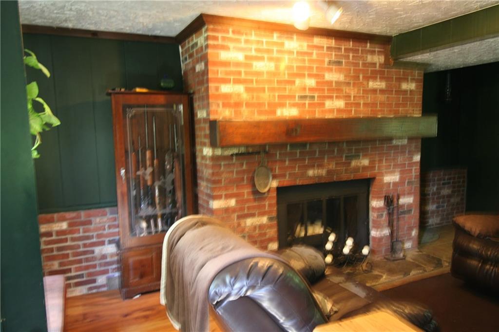 1640 Rutledge Road Transfer, PA 16154 - Photo 12 of 18 Den with Fireplace