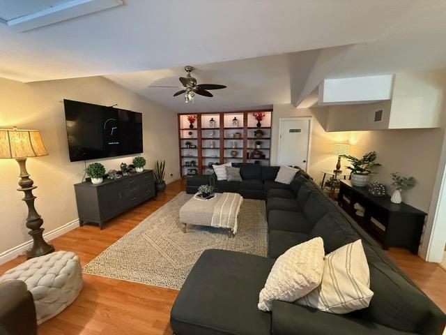 7610 Miller Avenue Gilroy, CA 95020 - Photo 12 of 49 a living room with furniture and a flat screen tv