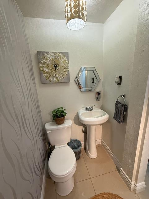 7610 Miller Avenue Gilroy, CA 95020 - Photo 32 of 49 a bathroom with a toilet a sink and a mirror