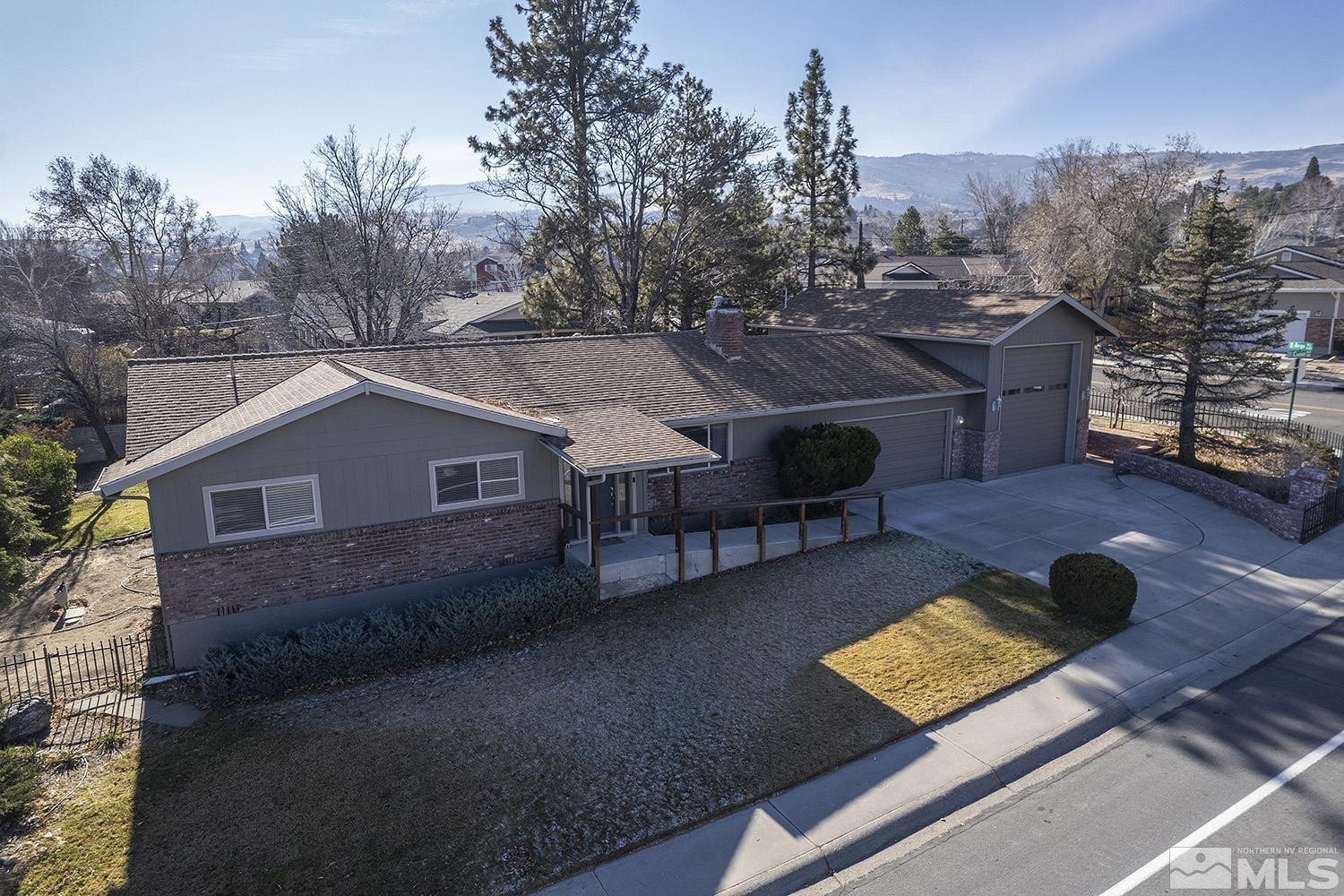 3310 Cashill Boulevard Reno, NV 89509 - Photo 2 of 40 a view of a house with a yard and sitting area