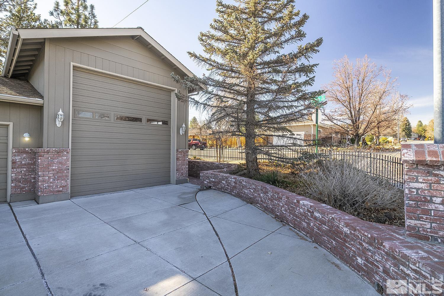 3310 Cashill Boulevard Reno, NV 89509 - Photo 34 of 40 a view of a house with a yard