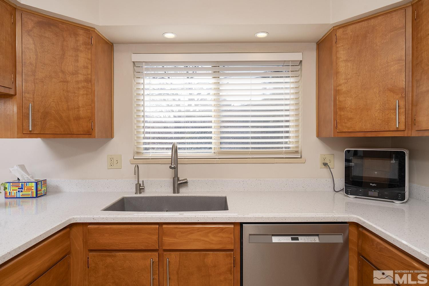 3310 Cashill Boulevard Reno, NV 89509 - Photo 10 of 40 a kitchen with a window a sink and a microwave