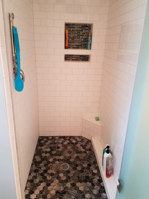64 Ridge Road Longmeadow, MA 01106 - Photo 19 of 29 a bathroom with a sink and a shower