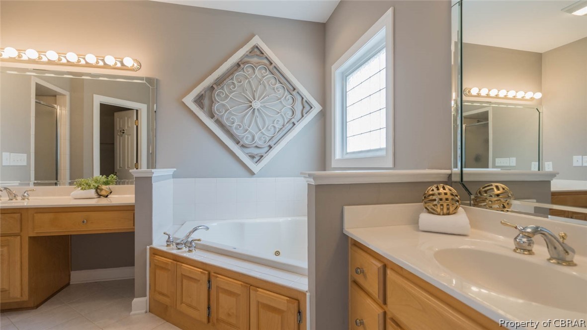 3124 Ridge Drive Toano, VA 23168 - Photo 42 of 50 Dbl sinks, jetted tub and plenty of storage too.