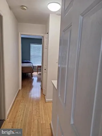 a balcony with table and chairs