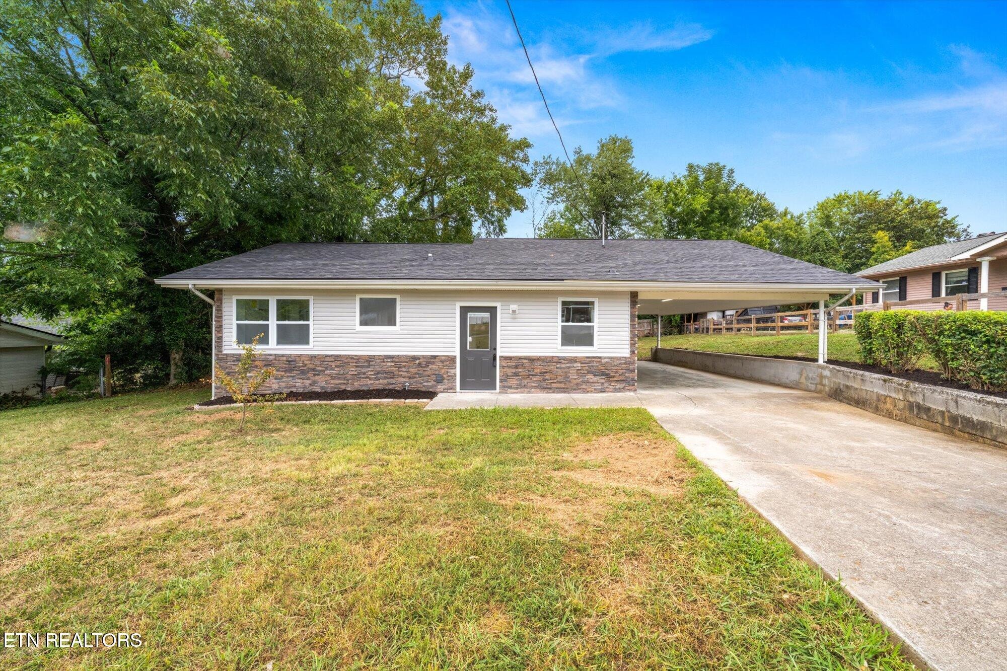 103 Parsons Road Oak Ridge, TN 37830 - Photo 1 of 27 a view of outdoor space yard and swimming pool