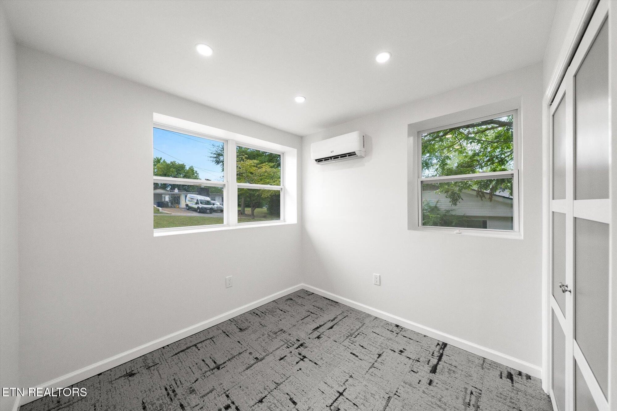 103 Parsons Road Oak Ridge, TN 37830 - Photo 14 of 27 an empty room with windows