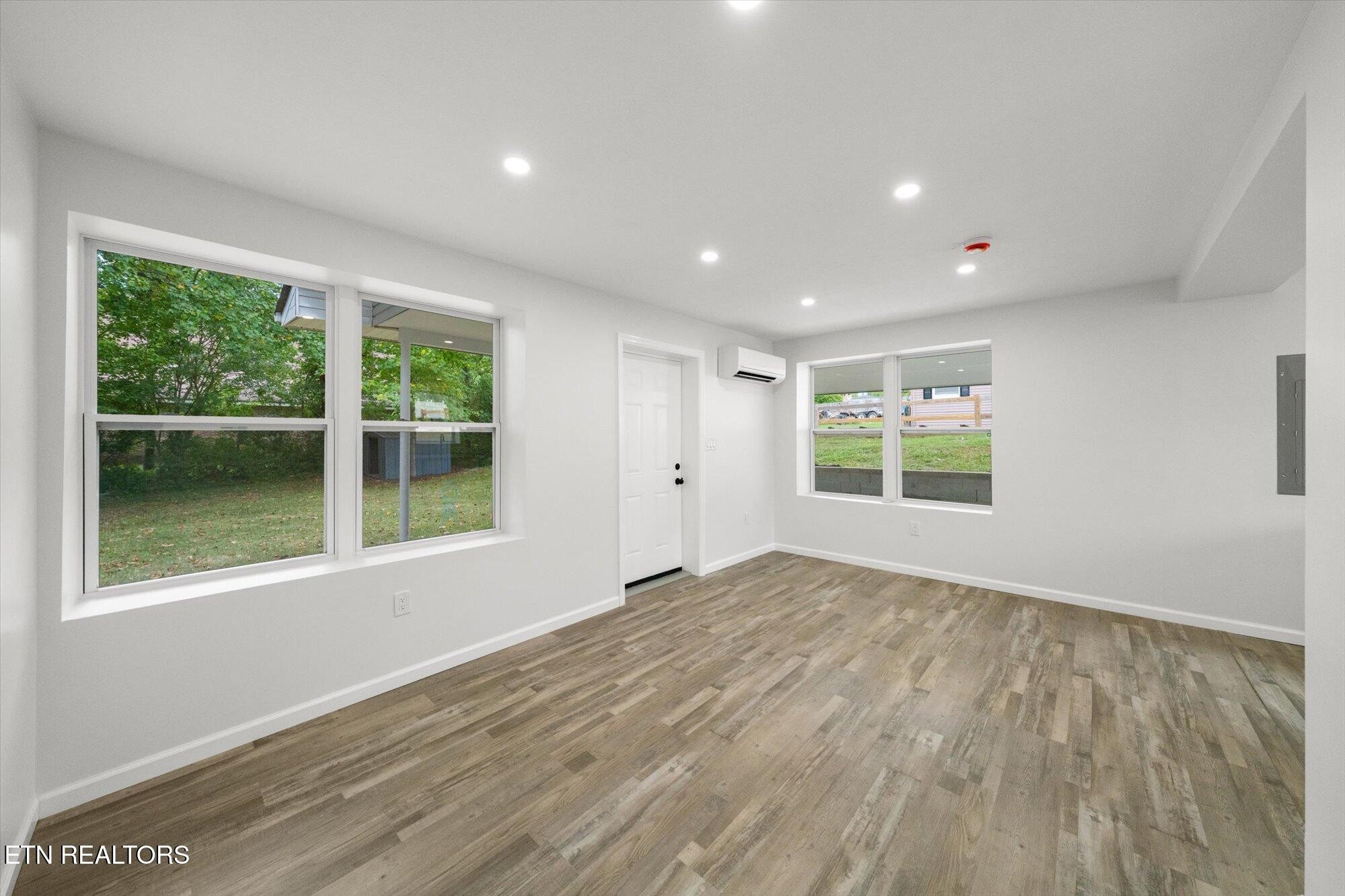 103 Parsons Road Oak Ridge, TN 37830 - Photo 5 of 27 a view of an empty room with a window