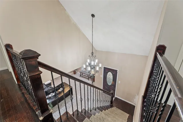 a view of a hallway with seating area