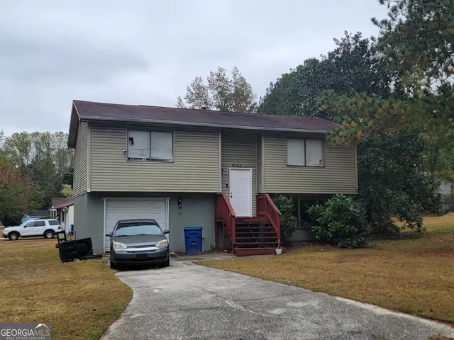 a house view with a outdoor space