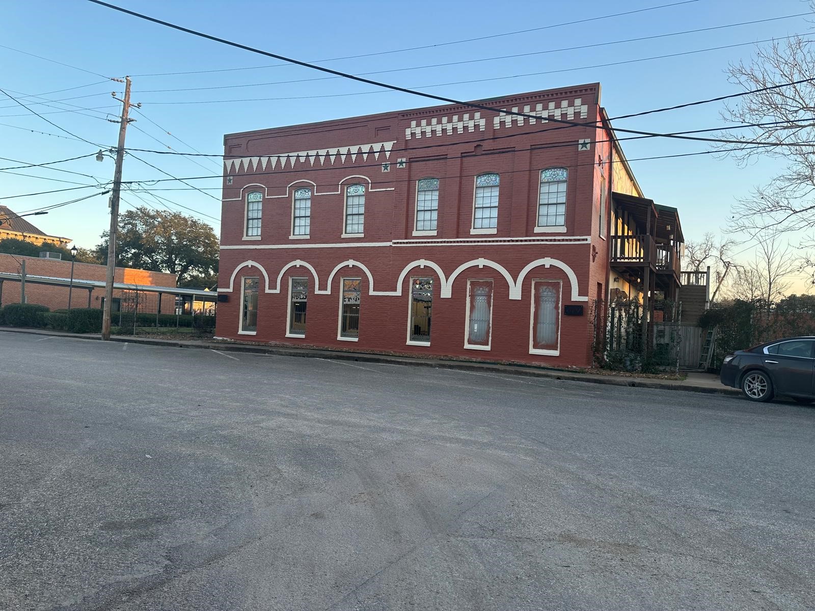 519 Spring Street, Unit G Columbus, TX 78934 - Photo 8 of 8 Charming apartment situated at the back of this classic brick building.