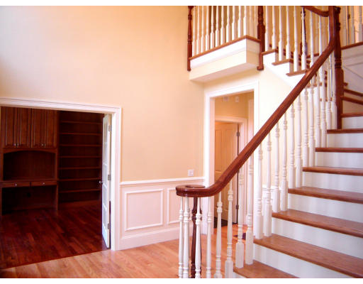 30 Applecrest Road Weston, MA 02493 - Photo 5 of 17 a view of staircase with wooden floor and white walls