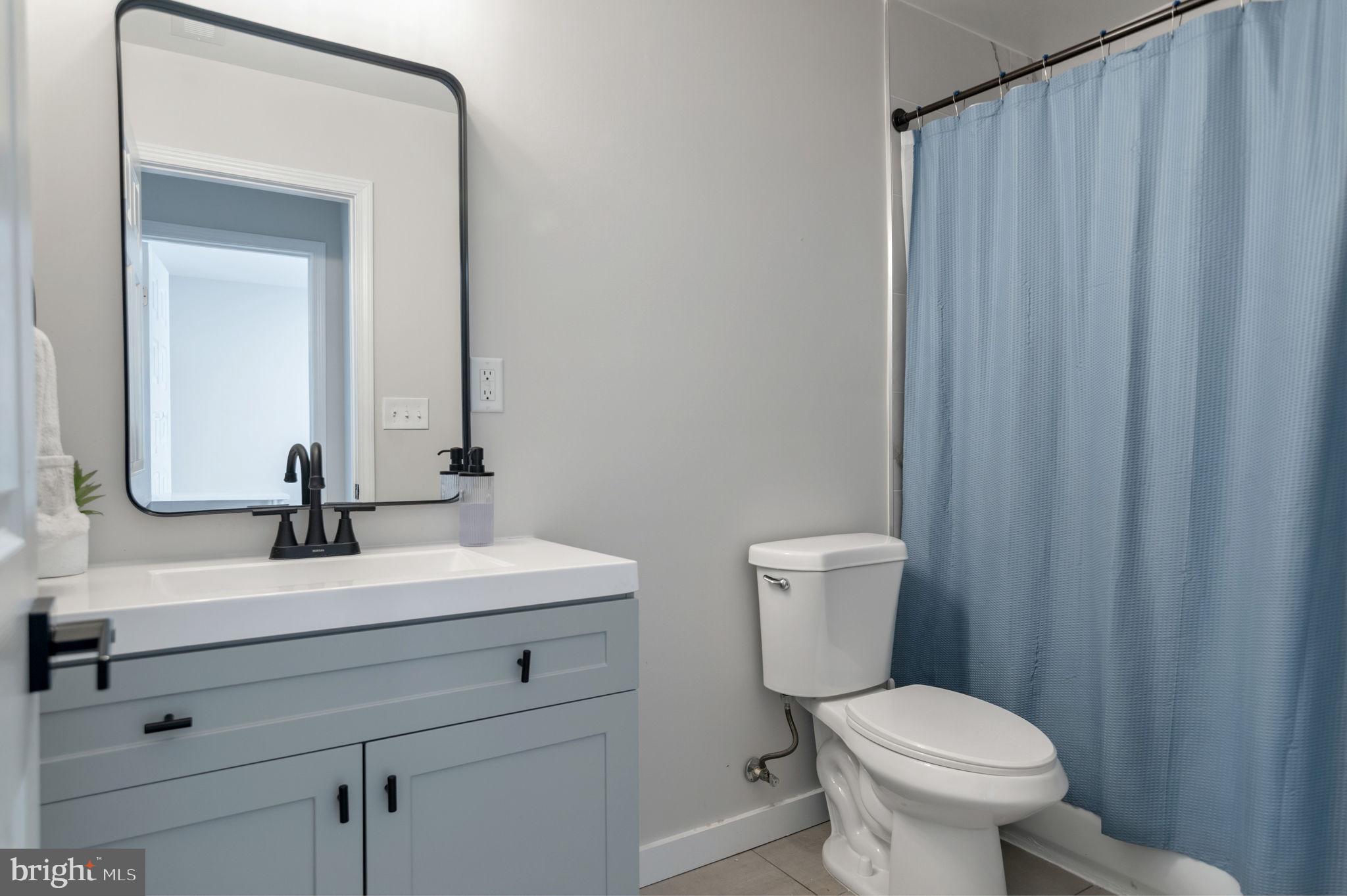 211 North Hammonds Ferry Road Linthicum Heights, MD 21090 - Photo 29 of 41 hallway bathroom