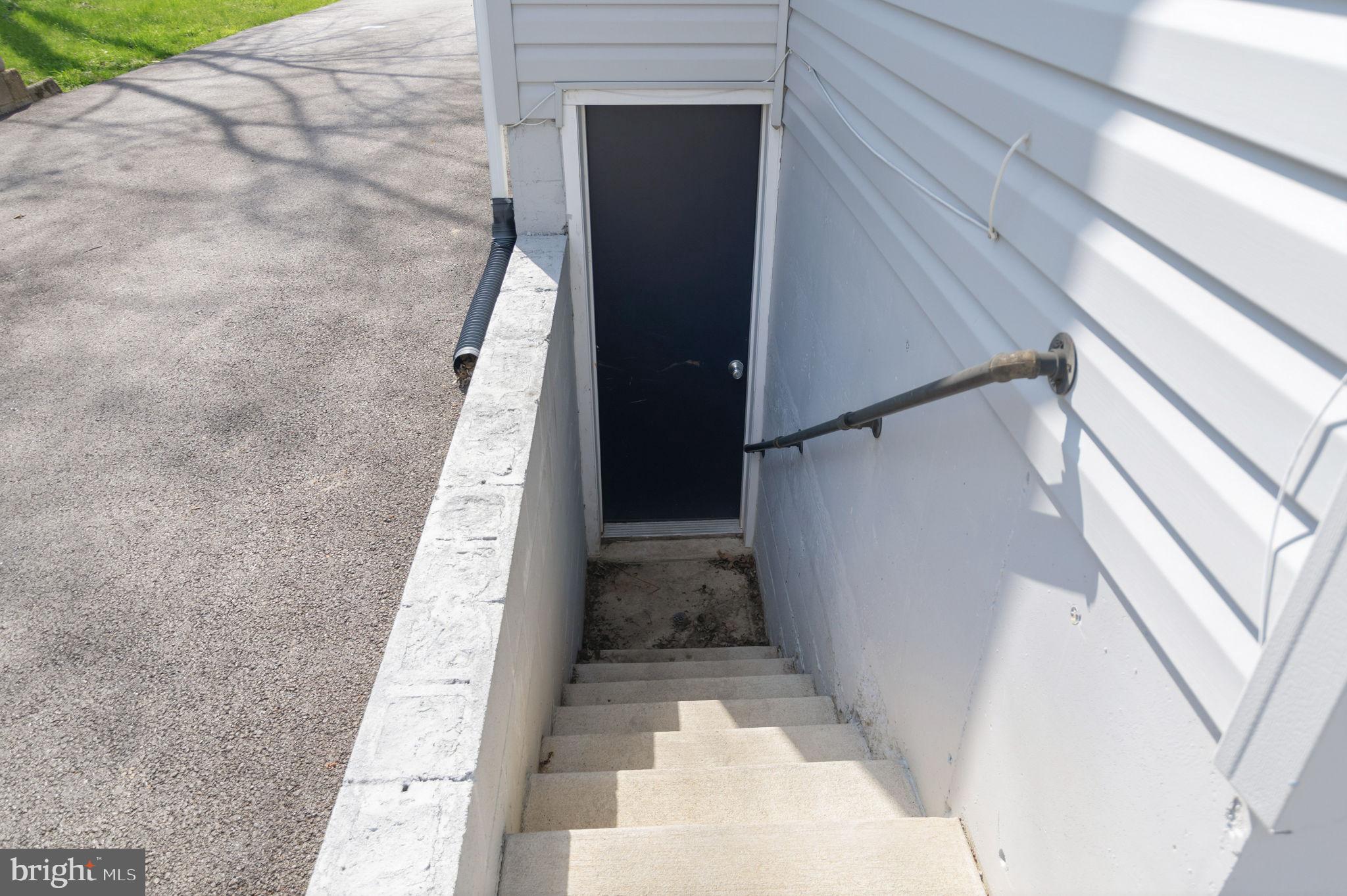 211 North Hammonds Ferry Road Linthicum Heights, MD 21090 - Photo 34 of 41 exterior entrance to basement