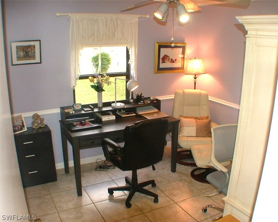 17408 Lebanon Road Fort Myers, FL 33967 - Photo 13 of 20 a view of a workspace with furniture and a window