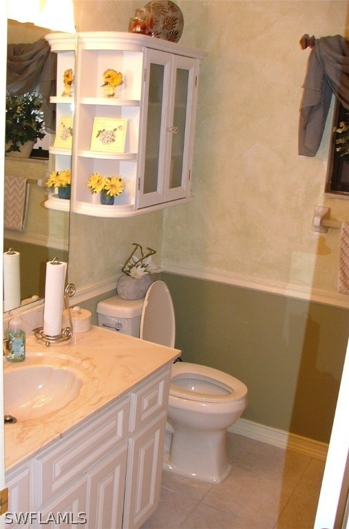 17408 Lebanon Road Fort Myers, FL 33967 - Photo 14 of 20 a bathroom with a sink a toilet and mirror