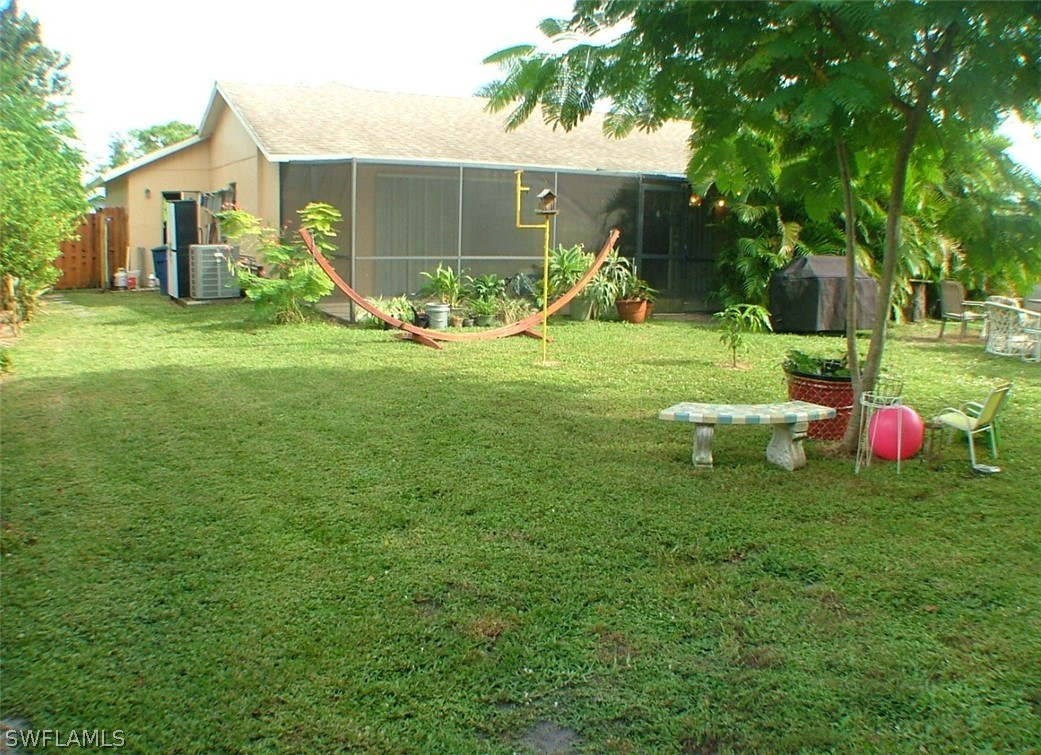 17408 Lebanon Road Fort Myers, FL 33967 - Photo 16 of 20 a view of a house with backyard