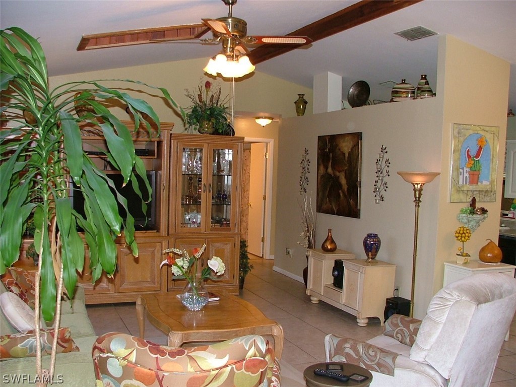 17408 Lebanon Road Fort Myers, FL 33967 - Photo 5 of 20 a view of a livingroom with furniture and a ceiling fan