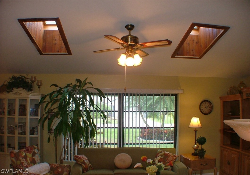 17408 Lebanon Road Fort Myers, FL 33967 - Photo 6 of 20 a view of entryway and hall with wooden floor