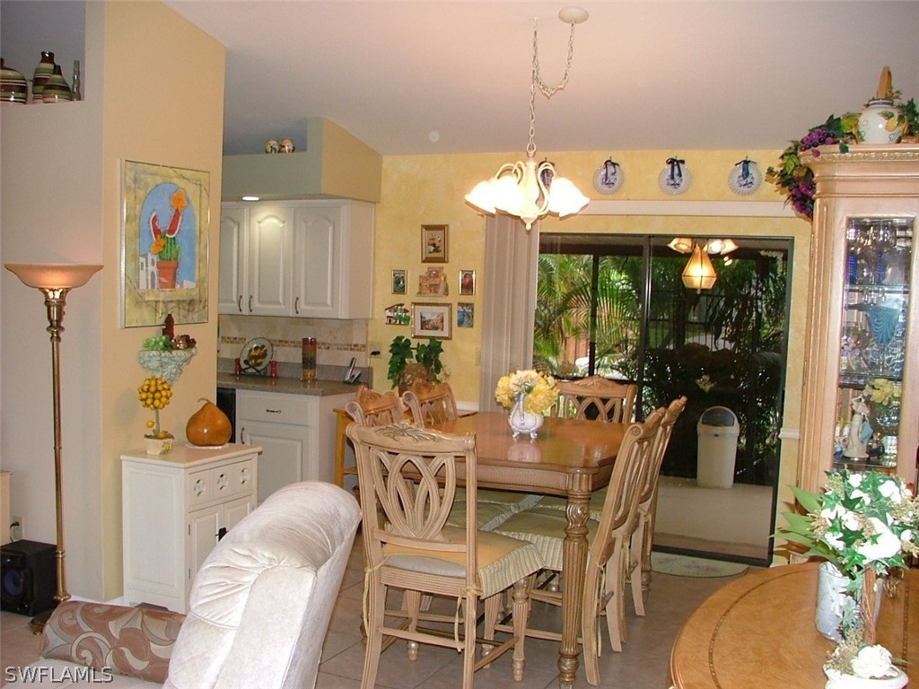 17408 Lebanon Road Fort Myers, FL 33967 - Photo 8 of 20 a view of a dining room with furniture window and outside view