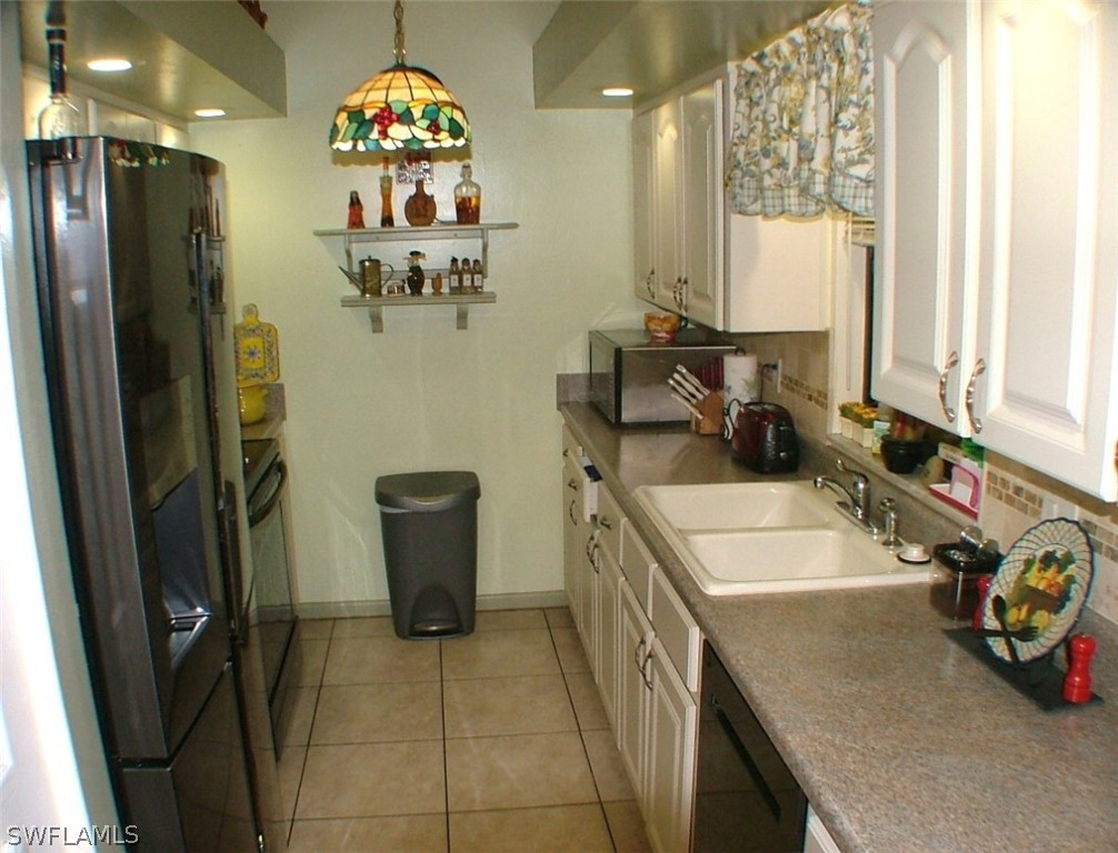 17408 Lebanon Road Fort Myers, FL 33967 - Photo 9 of 20 a room with storage and utility