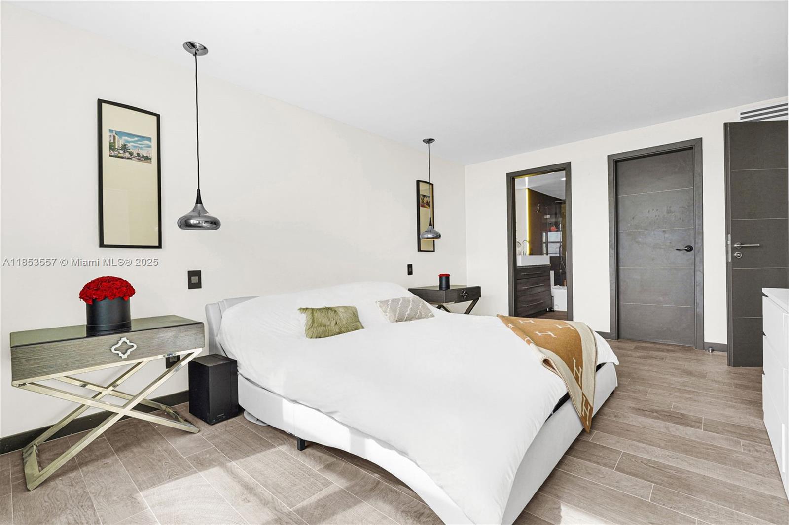 5151 Collins Avenue, Unit 1519 Miami Beach, FL 33140 - Photo 17 of 42 a bedroom with bed and window