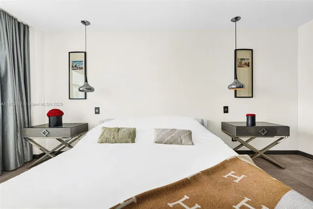 a bed room with a bed and a table