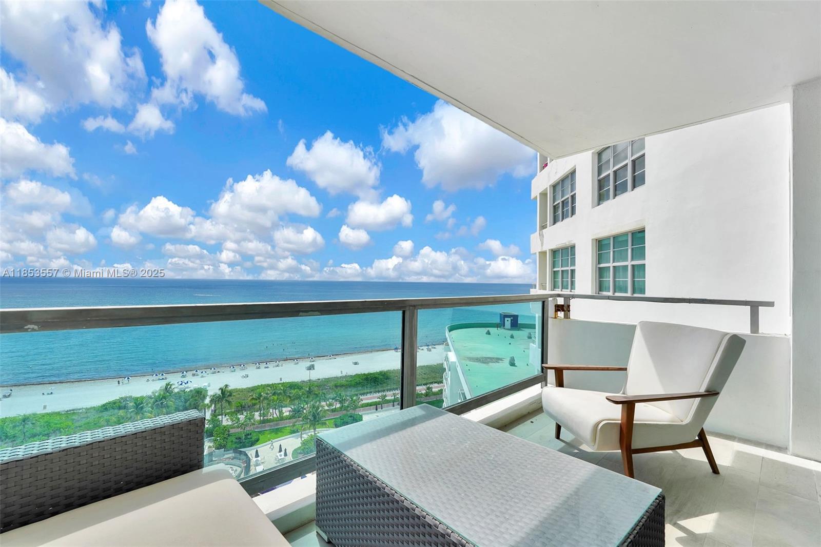 5151 Collins Avenue, Unit 1519 Miami Beach, FL 33140 - Photo 26 of 42 a view of a chairs and table in the balcony