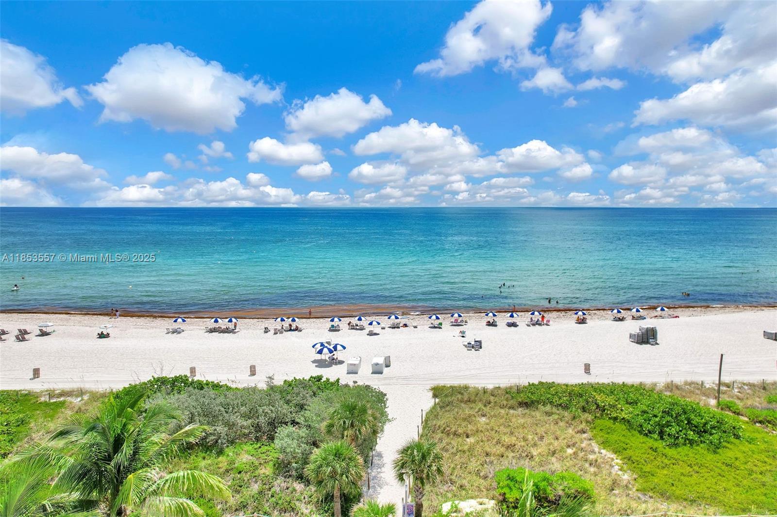 5151 Collins Avenue, Unit 1519 Miami Beach, FL 33140 - Photo 27 of 42 a view of a yard with an ocean view