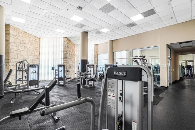 a view of a swimming pool with a yard