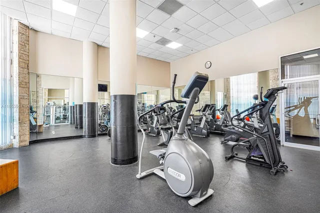 a living room with large windows
