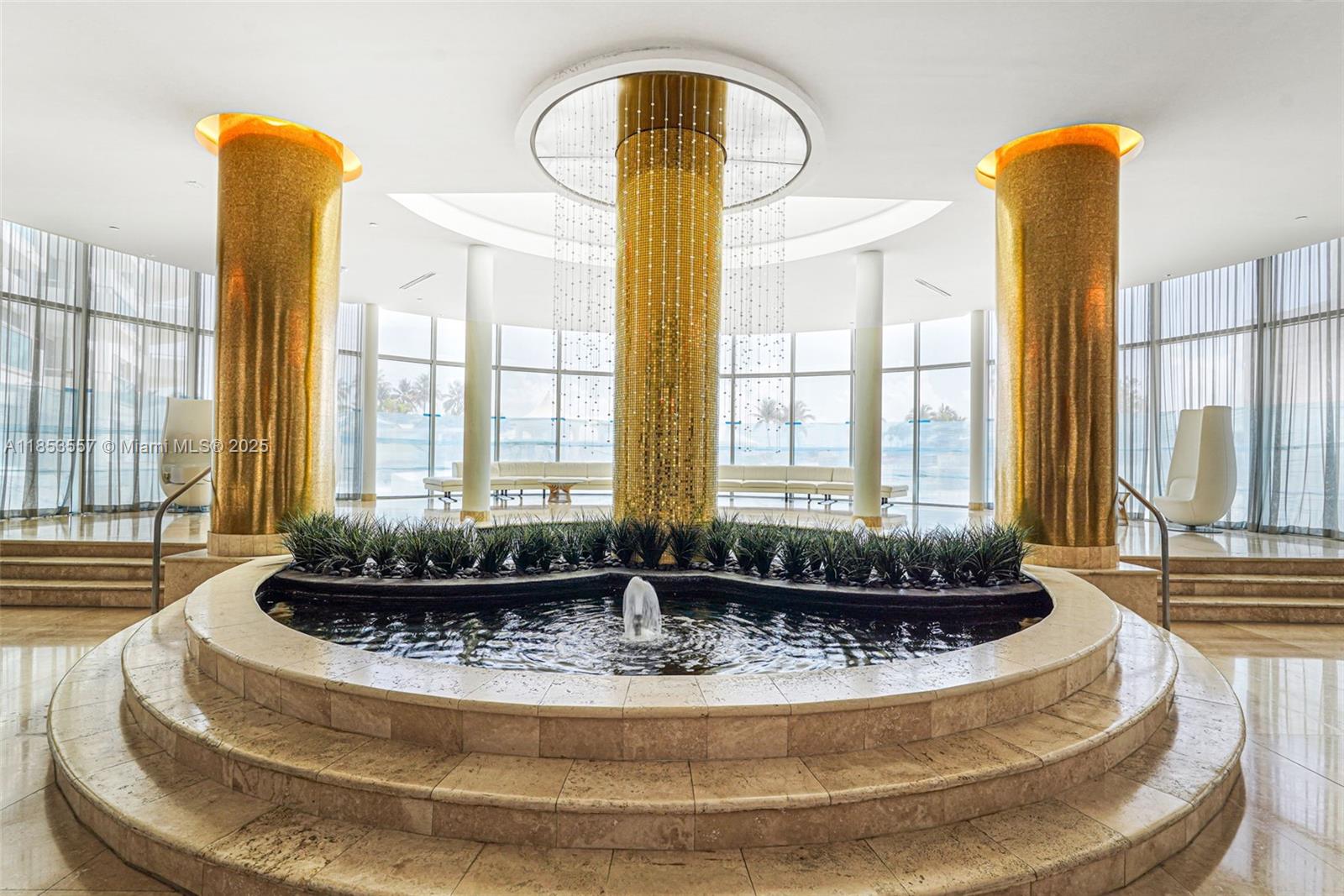 5151 Collins Avenue, Unit 1519 Miami Beach, FL 33140 - Photo 40 of 42 a view of a swimming pool with a yard