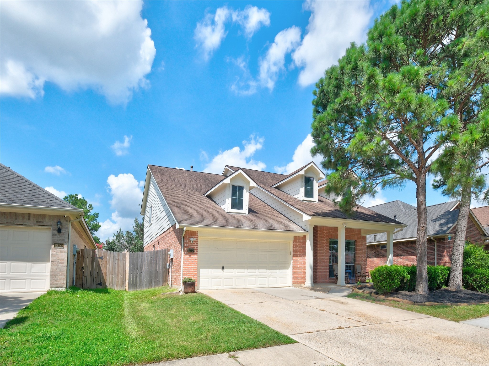 19327 Dickson Park Drive Spring, TX 77373 - Photo 2 of 47 a front view of a house with a yard