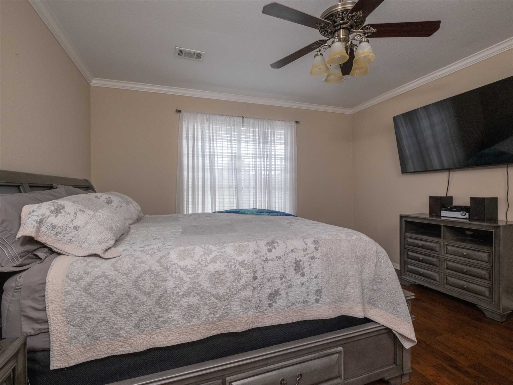 19327 Dickson Park Drive Spring, TX 77373 - Photo 22 of 47 a bedroom with a bed and flat screen tv
