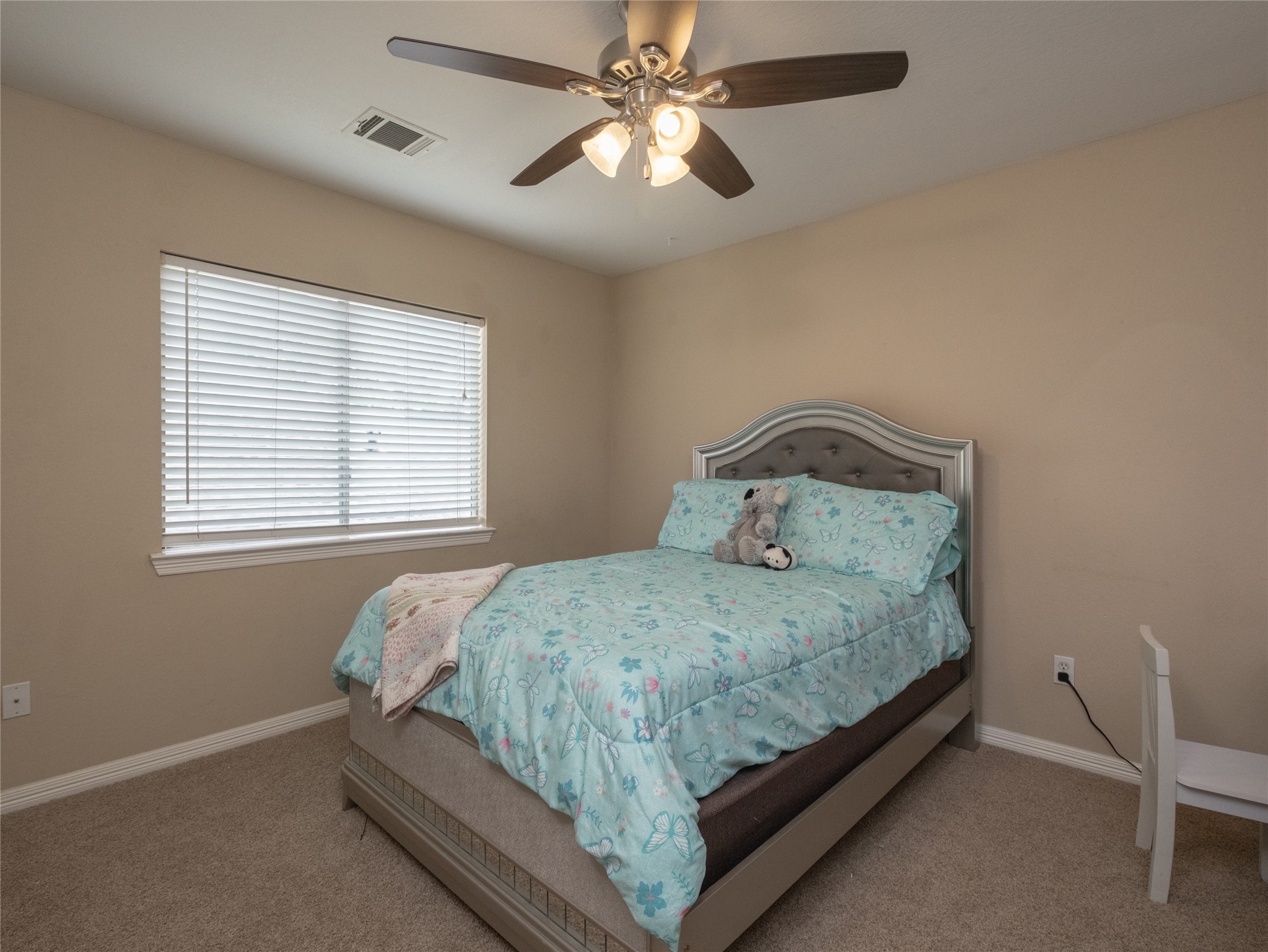 19327 Dickson Park Drive Spring, TX 77373 - Photo 36 of 47 a bed sitting in a bedroom next to a window