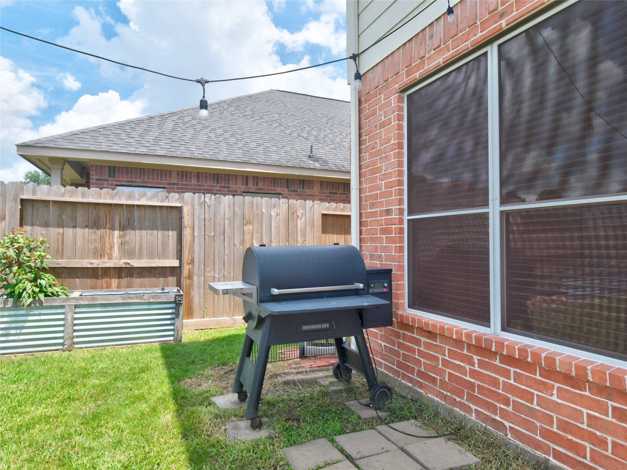 19327 Dickson Park Drive Spring, TX 77373 - Photo 47 of 47 a view of a chair and table in the back yard of the house