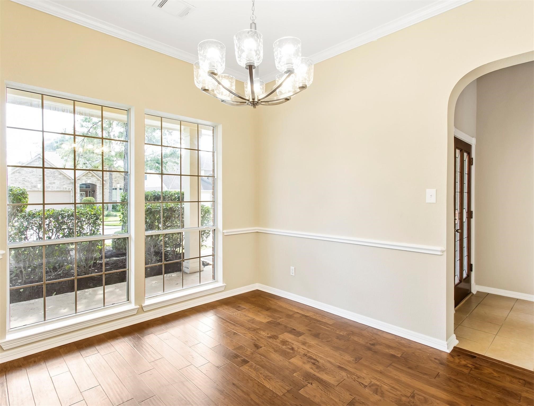19327 Dickson Park Drive Spring, TX 77373 - Photo 6 of 47 en empty room with wooden floor and windows