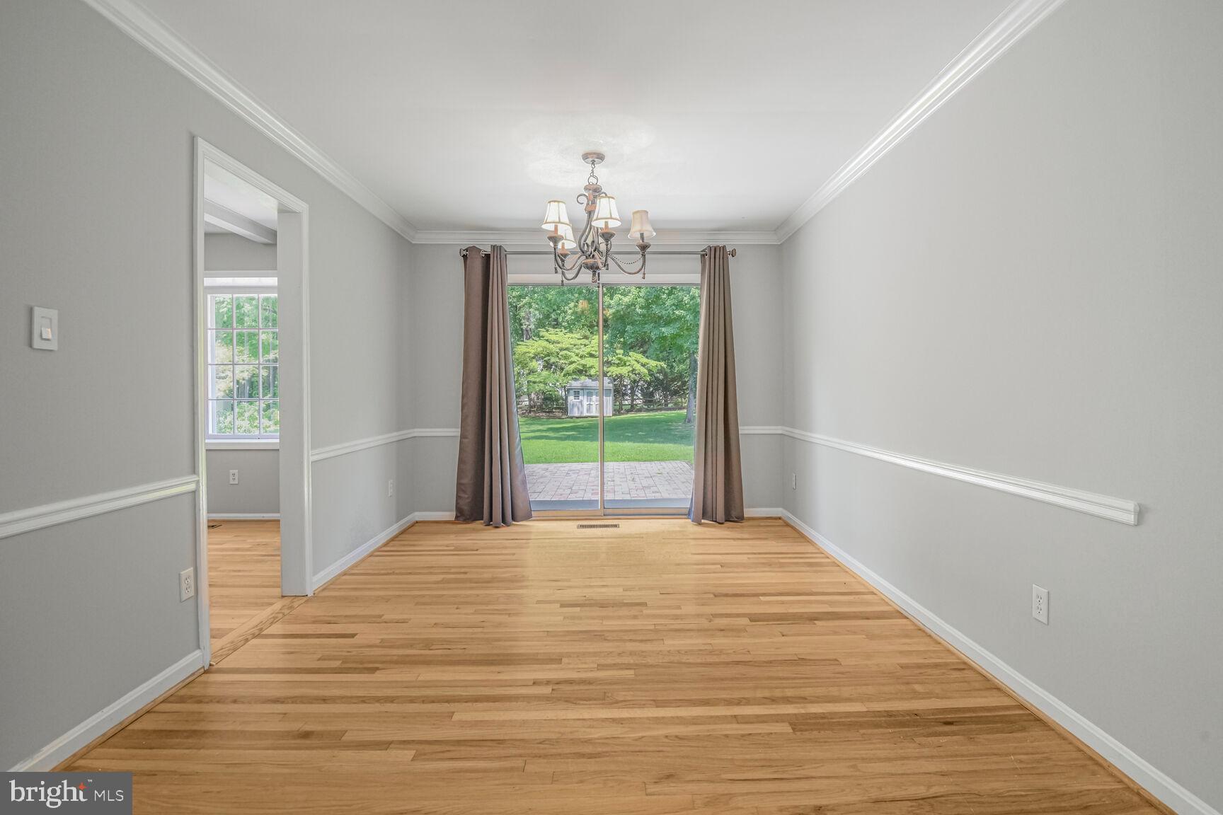 11733 Ambleside Drive Potomac, MD 20854 - Photo 13 of 29 a bedroom with a bed and a window