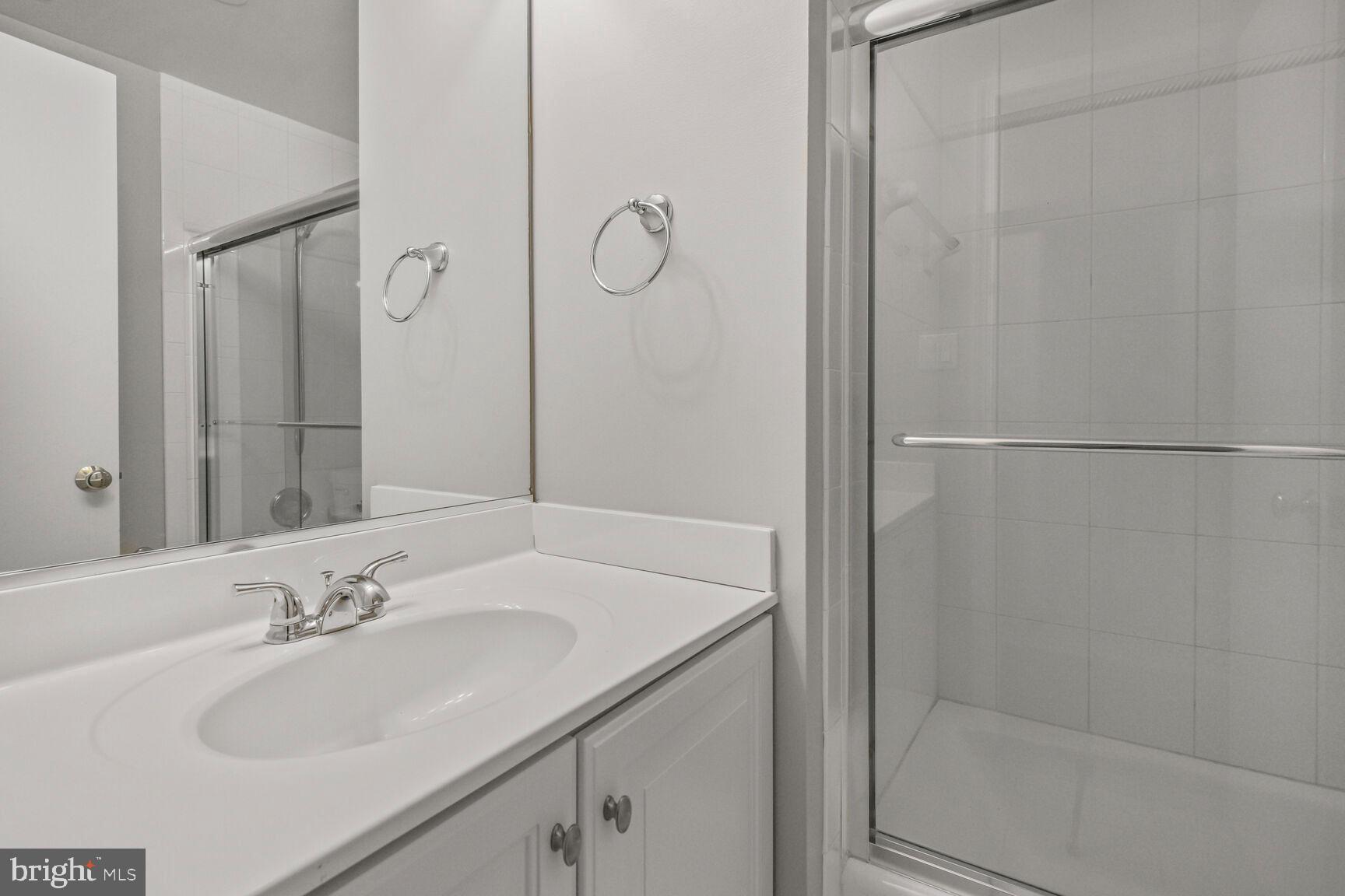 11733 Ambleside Drive Potomac, MD 20854 - Photo 19 of 29 a bathroom with a sink and a mirror