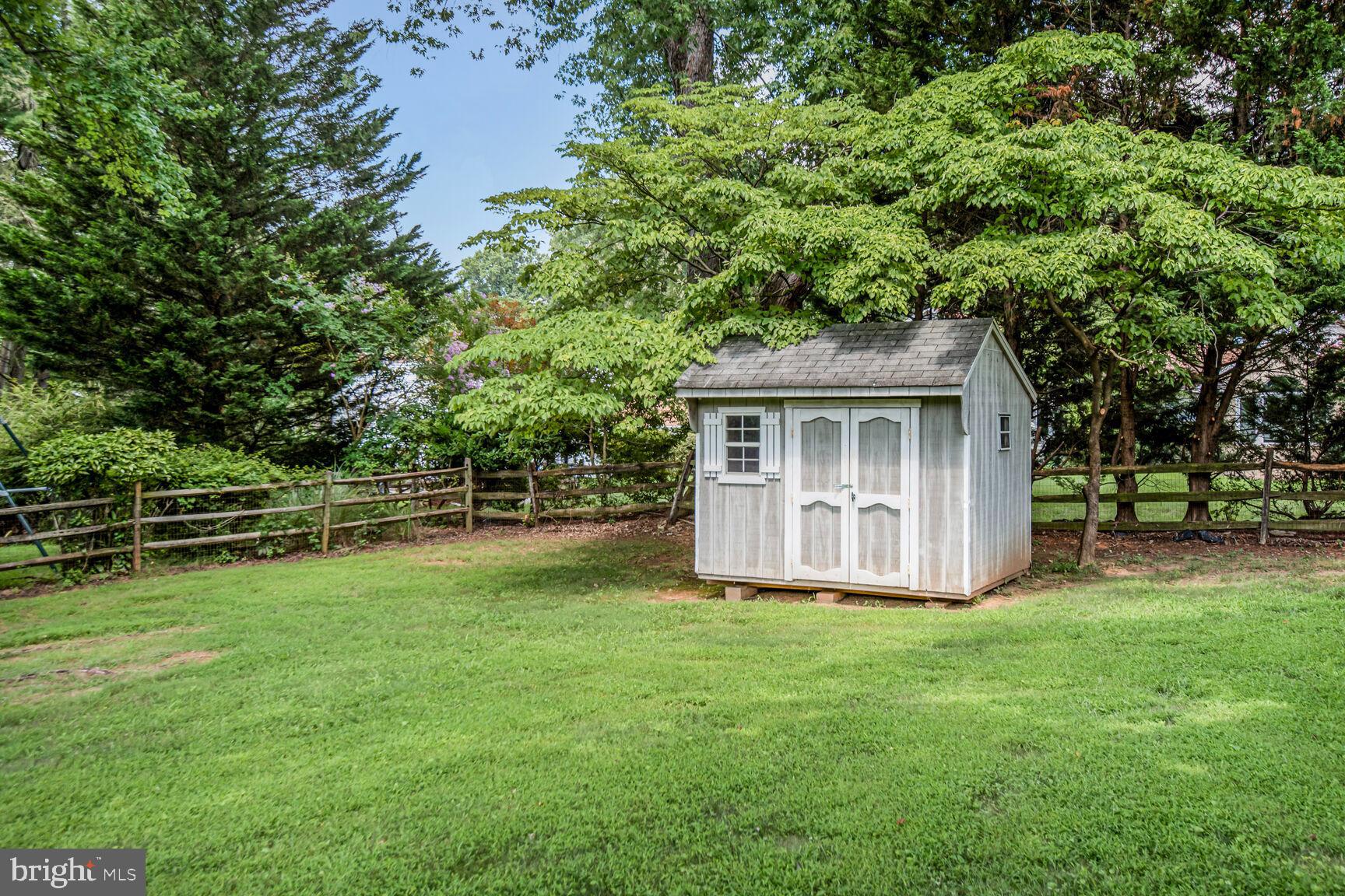 11733 Ambleside Drive Potomac, MD 20854 - Photo 29 of 29 a view of a house with a yard