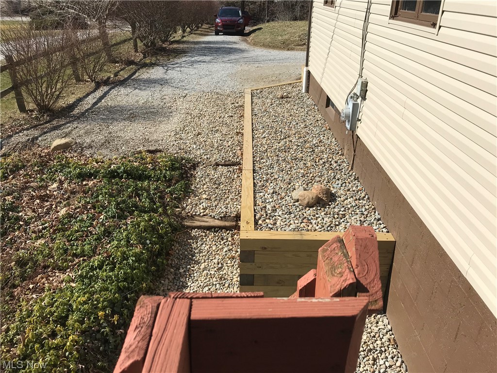 1610 Schroeder Road Mogadore, OH 44260 - Photo 15 of 46 View side yard with new rock