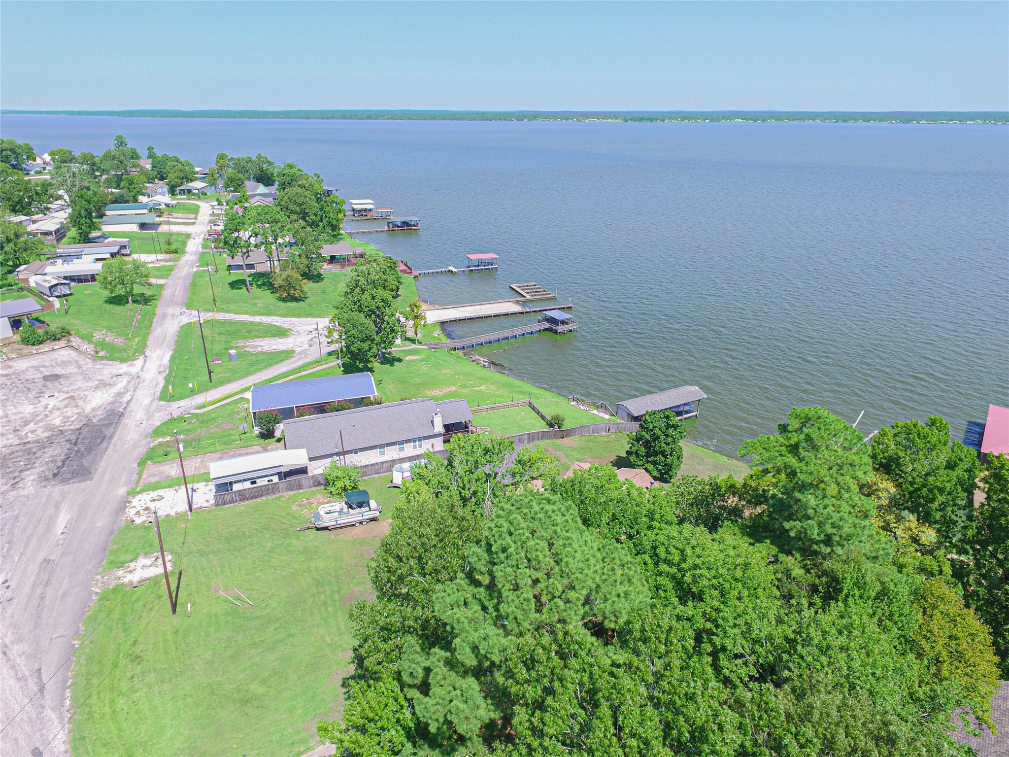 140 Lagoon Drive Point Blank, TX 77364 - Photo 17 of 22 an aerial view of a house with a yard