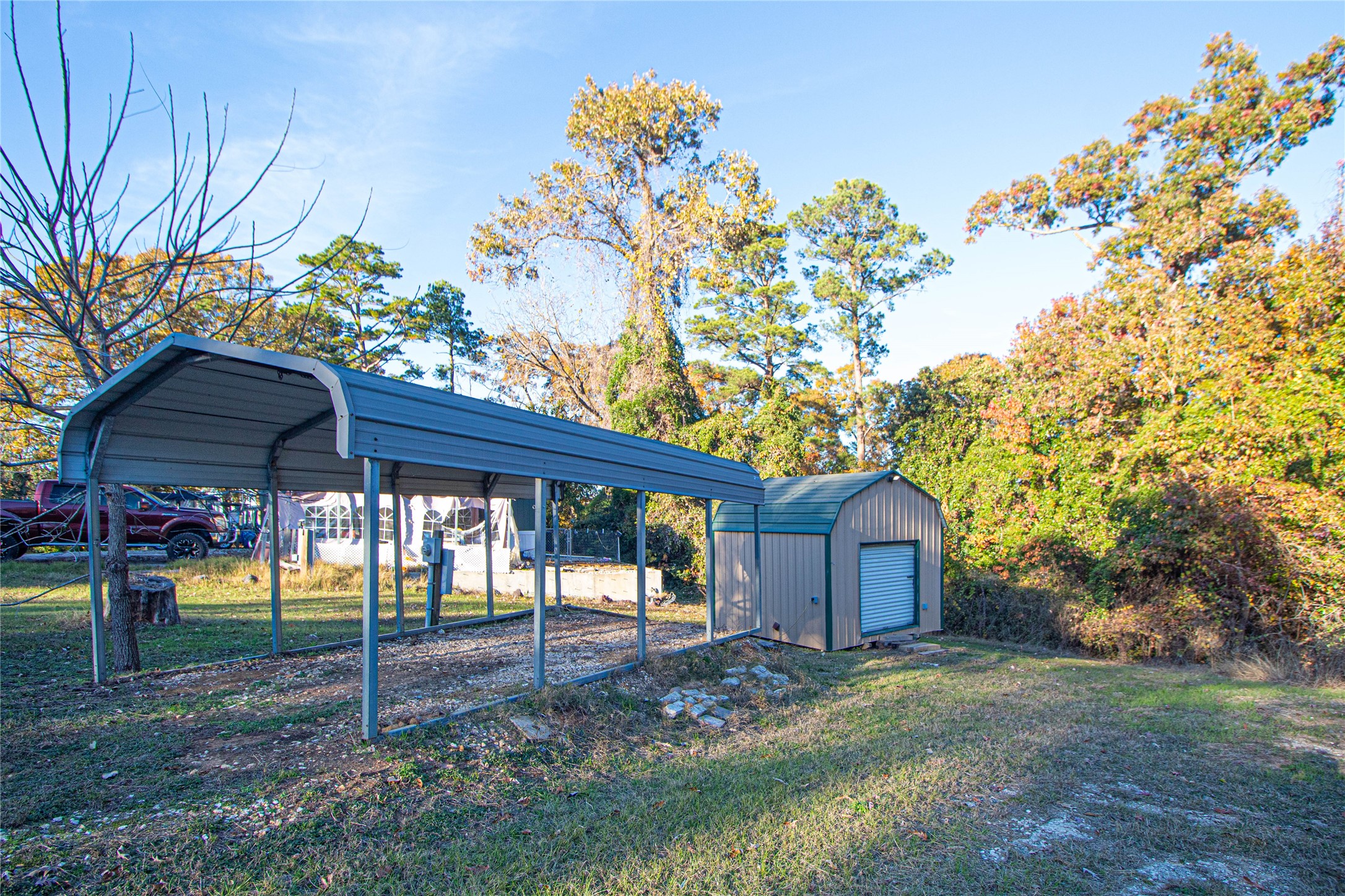 140 Lagoon Drive Point Blank, TX 77364 - Photo 7 of 22 a view of a house with backyard and a tree