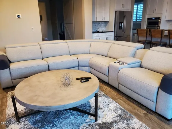 a living room with furniture and a couch